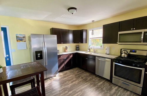 Rochester House | Charming remodeled 3 bedroom. Near RIT & U of R. Free on-site parking.