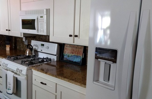 Marine Terrace House | Charming Remodeled Single Level. HotTub. Fenced backyard. Porch view!