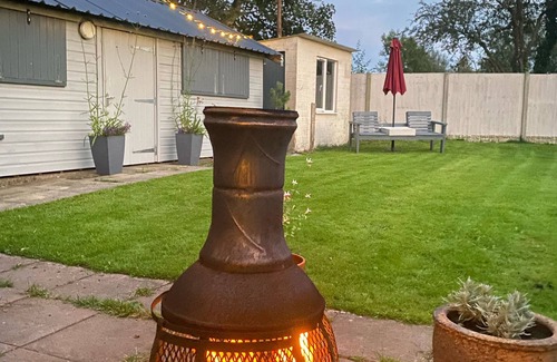 Llangefni House | Charming stylish stone cottage large sunny private garden with doorstep Parking