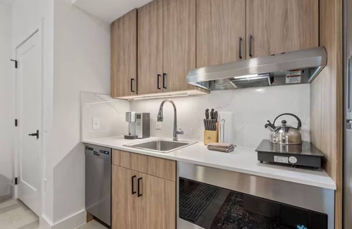 Main - Military Plaza Hotel | Charming Suite Steps from the Heart of the Historic Market District | 2 Units