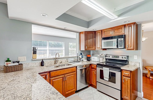 Port Saint Lucie House | Charming & sun-soaked coastal getaway with generous yard, patio, W/D, & AC