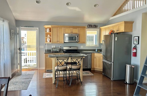 Normandy Beach House | Charming three bedroom 1 1/2 bath home with loft on the lagoon in Lavallette.