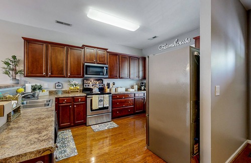 Winston - Salem House | Charming townhouse with pool, patio, central AC, & washer/dryer