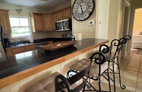 Magnolia Springs House | Charming two bedroom cottage steps away from Magnolia River in Magnolia Springs