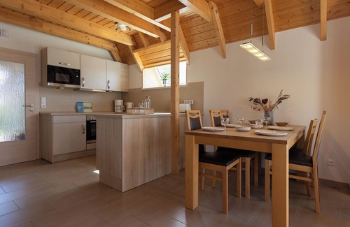 Dorumer Neufeld House | Charming vacation home Mellumplate 62 with wood-burning stove.