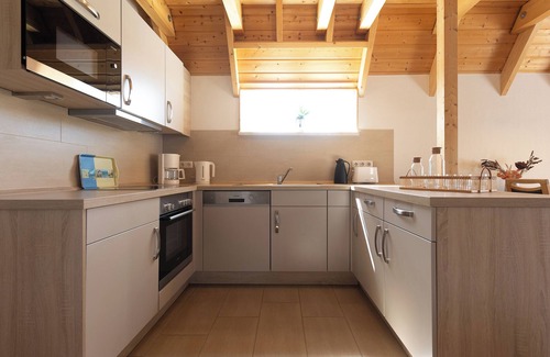 Dorumer Neufeld House | Charming vacation home Mellumplate 62 with wood-burning stove.