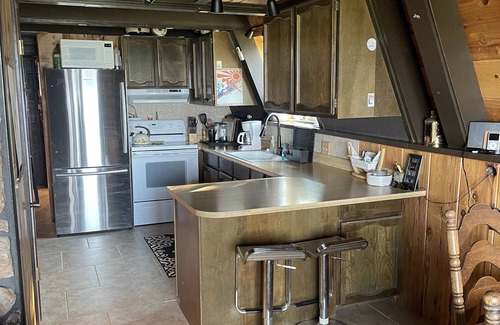 Sweetwater Cabin | Charming vintage A Frame Mountain Retreat with fantastic lake views
