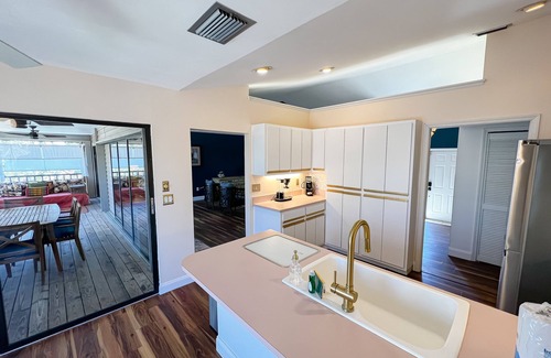 Dinkins Bayou House | Charmingly colorful home with deck, beach gear, AC & W/D - dog-friendly