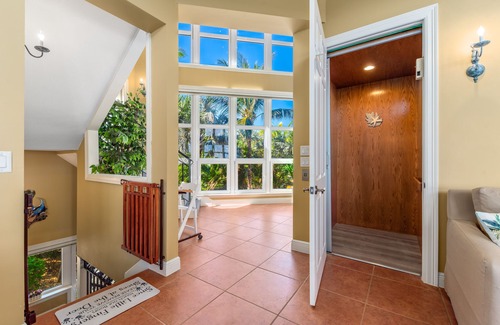 Jensen Beach House | Chateau de la Mer: Gated Fla Beach Estate w/heated pool, hot tub, elevator.