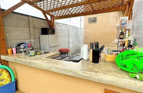 Jaco House | Cheap Hotel in Jaco Kitchen+Pool+Gym+Pickleball