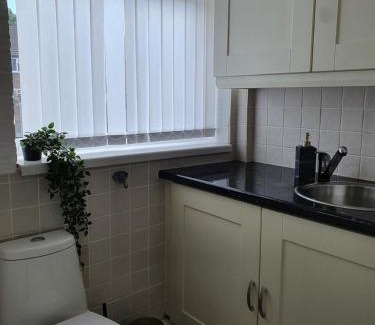 Pendlebury House | Cheerful 3 bedroom house with spacious garden