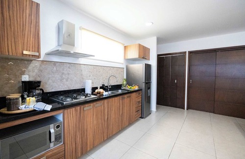 Diaz Ordaz Apartment | Cheerful Condo, Mountainview Roof and Lounge