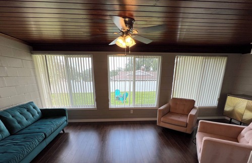 Eustis House | Cheerful, cozy home with loft and beautiful sunsets
