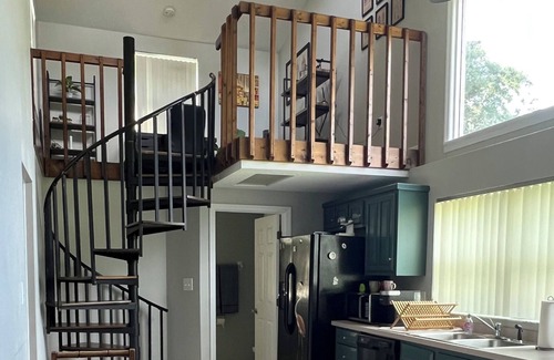 Eustis House | Cheerful, cozy home with loft and beautiful sunsets