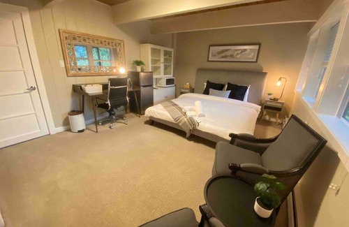 Caulfeild House | Cheerful master bedroom in Cedar Woods!