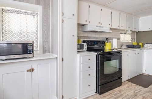 Denton House | Cheerful Wooded Retreat: 2BD/1BA | Denton