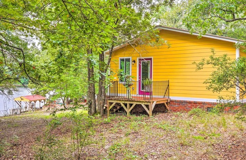 South Carolina Lakes & Blackwater Rivers Cottage | Cheery Swansea Home on Calmont Pond w/Dock!