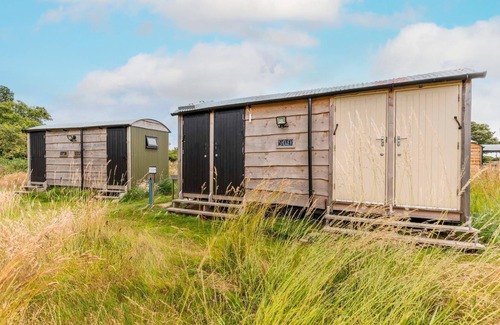 Trunch Cabin | Cheviot Shepherd Hut | a glamping shepherds hut perfect for a small family with children