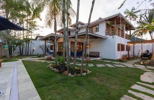 Juquehy Villa | Chez Marguera em Juquehy - Luxo com muito espaço, conforto e lazer - incluso roupas de cama e banho, diarista, serviço praia, piscina aquecida, maquina gelo, cervejeira, karaoke - PET friendly