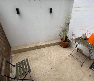 West Kensington Apartment | Chic 1BD Flat wPatio - 2 Mins from Baron's Court!