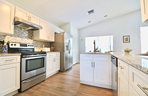 Lindfields House | Chic 4-Bedroom Home w/Pool, Lake View, & Games Room - Minutes from Disney
