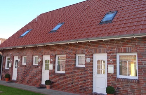 Horum House | Chic and idyllic location: The terraced house with its approx. 70 square meters is modern