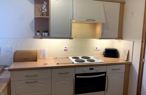 Uphall Apartment | Chic Apartment with Deer Park Golf Course Views