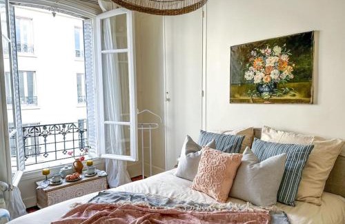 Quartier du Pont-de-Flandre Apartment | Chic entre Histoire et Modernité