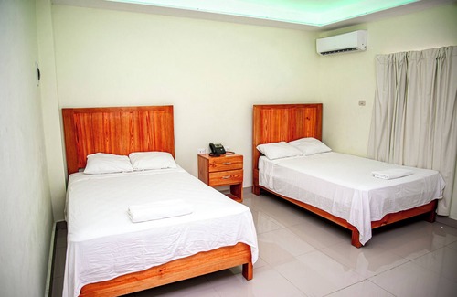 Punta Cana Apartment | Chic hotel in Punta Cana (room with 2 double beds).