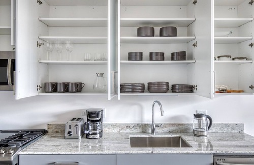 Logan Square Apartment | Chic Logan Square Studio w/Roof Deck & Gym, 1 block to L, by Blueground