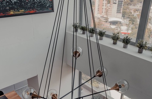 El Castillo Apartment | Chic Poblado Penthouse - AC, chef's kitchen, full washer & dryer, amazing views