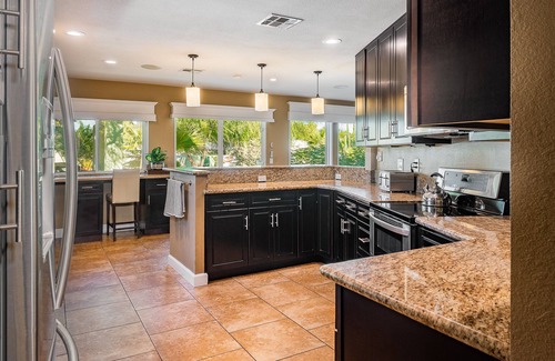 Paradise Villa | Chic Poolside Retreat: 20K Recent Reno, Stunning Hardscape, Pet-Friendly Vibes