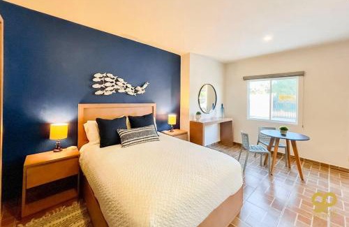 El Centenario Apartment | Chic Studio Kitchen WiFi TV Steps to Beach