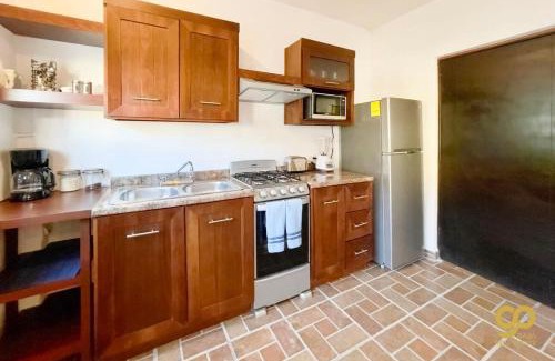 El Centenario Apartment | Chic Studio Kitchen WiFi TV Steps to Beach