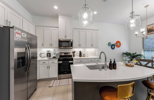 Lewisville House | Chic Townhome: Arcade Games, EV Charging, Putting Green, & Luxury Decor!
