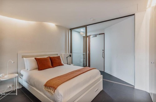 City West Apartment | City Centre Pad with Balcony and Leafy Park Views