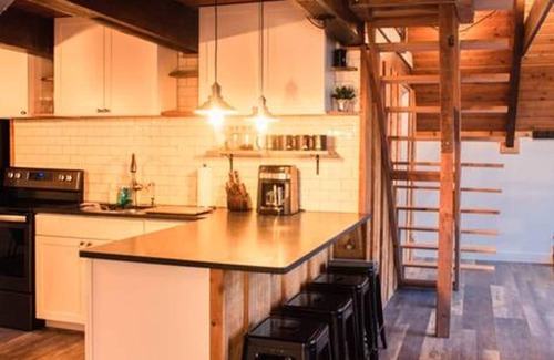 Whitefish House | Classic A-frame - Sleek Modern Interior
