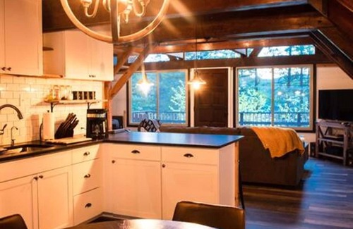 Whitefish House | Classic A-frame - Sleek Modern Interior