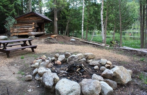 Saranac Lake House | Classic Adirondack Lean-to with shower, fire pit, dock and waterfront