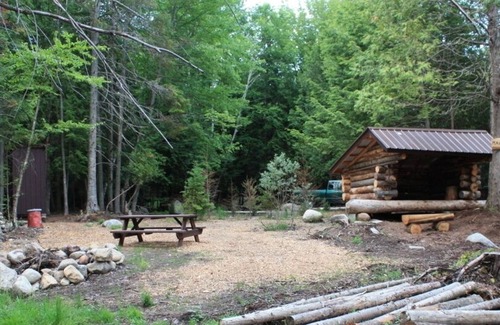 Saranac Lake House | Classic Adirondack Lean-to with shower, fire pit, dock and waterfront