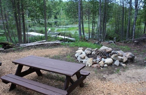 Saranac Lake House | Classic Adirondack Lean-to with shower, fire pit, dock and waterfront