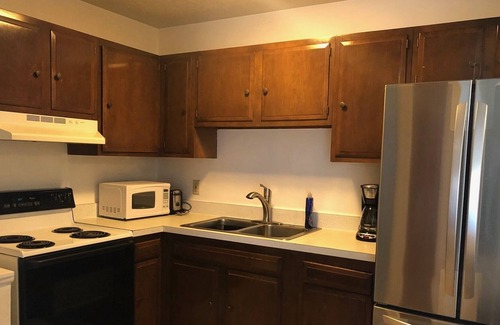 Maple Heights Apartment | Classic Elegance with Assigned Parking