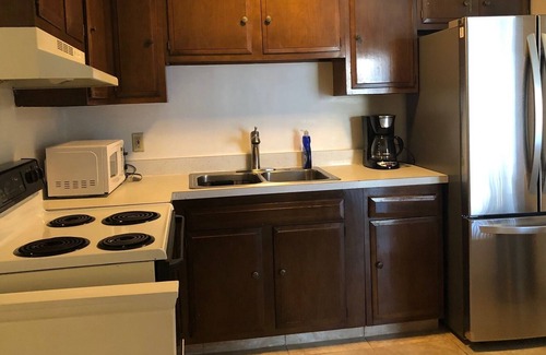 Maple Heights Apartment | Classic Elegance with Assigned Parking