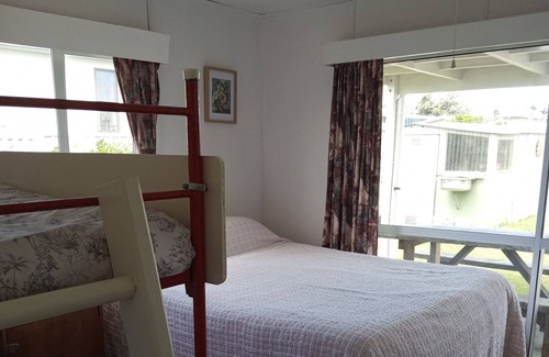 Karkari Peninsula Cottage | Classic Kiwi Bach.
