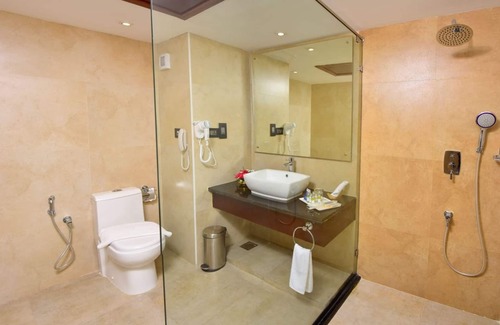 Karumom Hotel | Classic Sarovar Portico Thiruvananthapuram