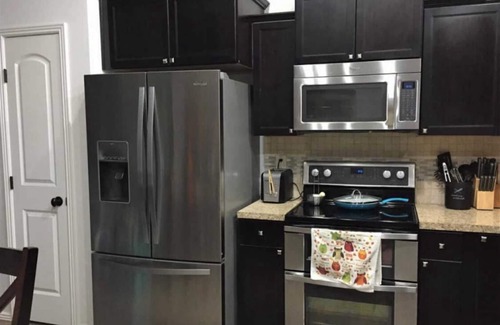 Kimberly House | Clean & next to park! 4-bedroom house with AC, WiFi & fenced yard in Kimberly