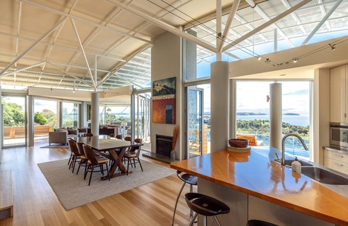 Matiatia Bay House | Cliff seated with fabulous sea views, a solar heated pool and a new spa pool!