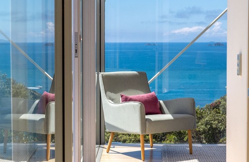 Matiatia Bay House | Cliff seated with fabulous sea views, a solar heated pool and a new spa pool!