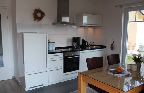 Nienhagen Apartment | Cliffside accommodation, WLAN, terrace, washing machine