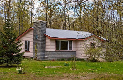 Carp Lake House | Close to Mackinaw City. Nestled in the woods, near the lakes and trails.